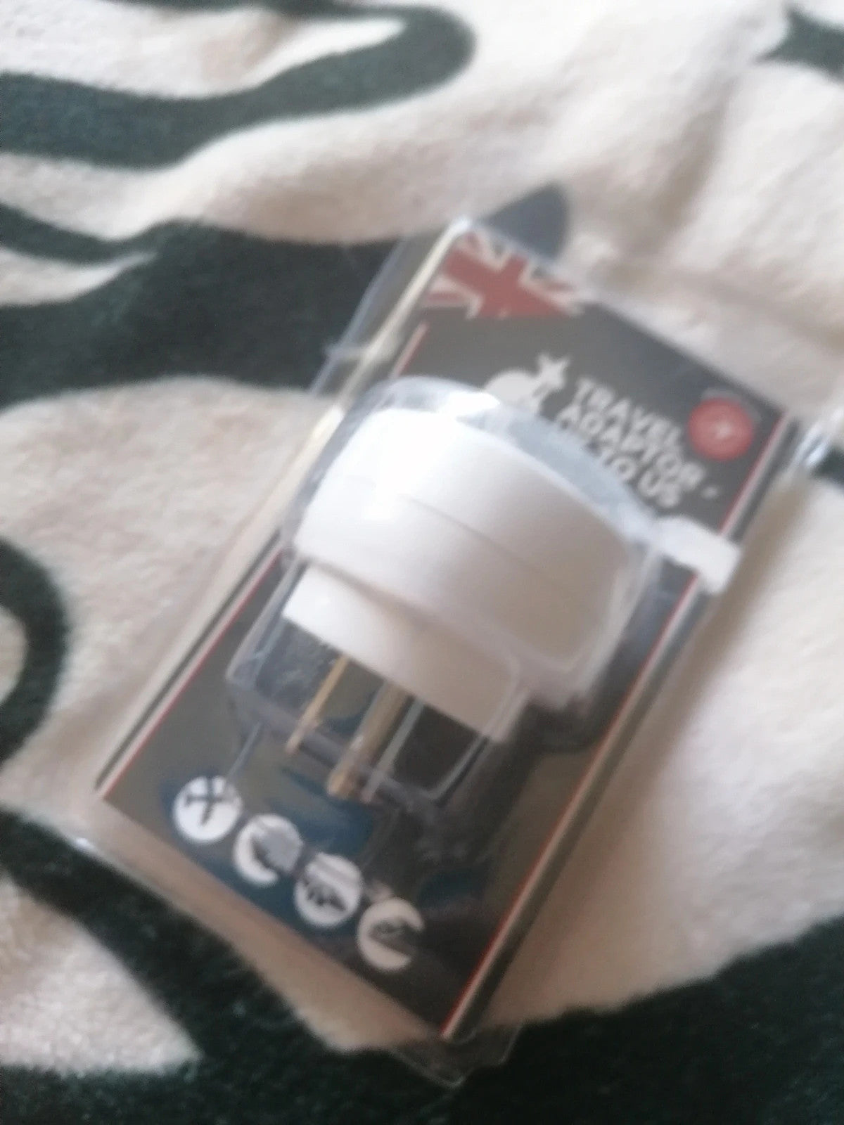 Kangol white travel adaptor set of three, designed for UK to US conversion.