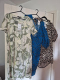 Next multi linen maxi dresses size 12 with tags, featuring vibrant floral patterns.