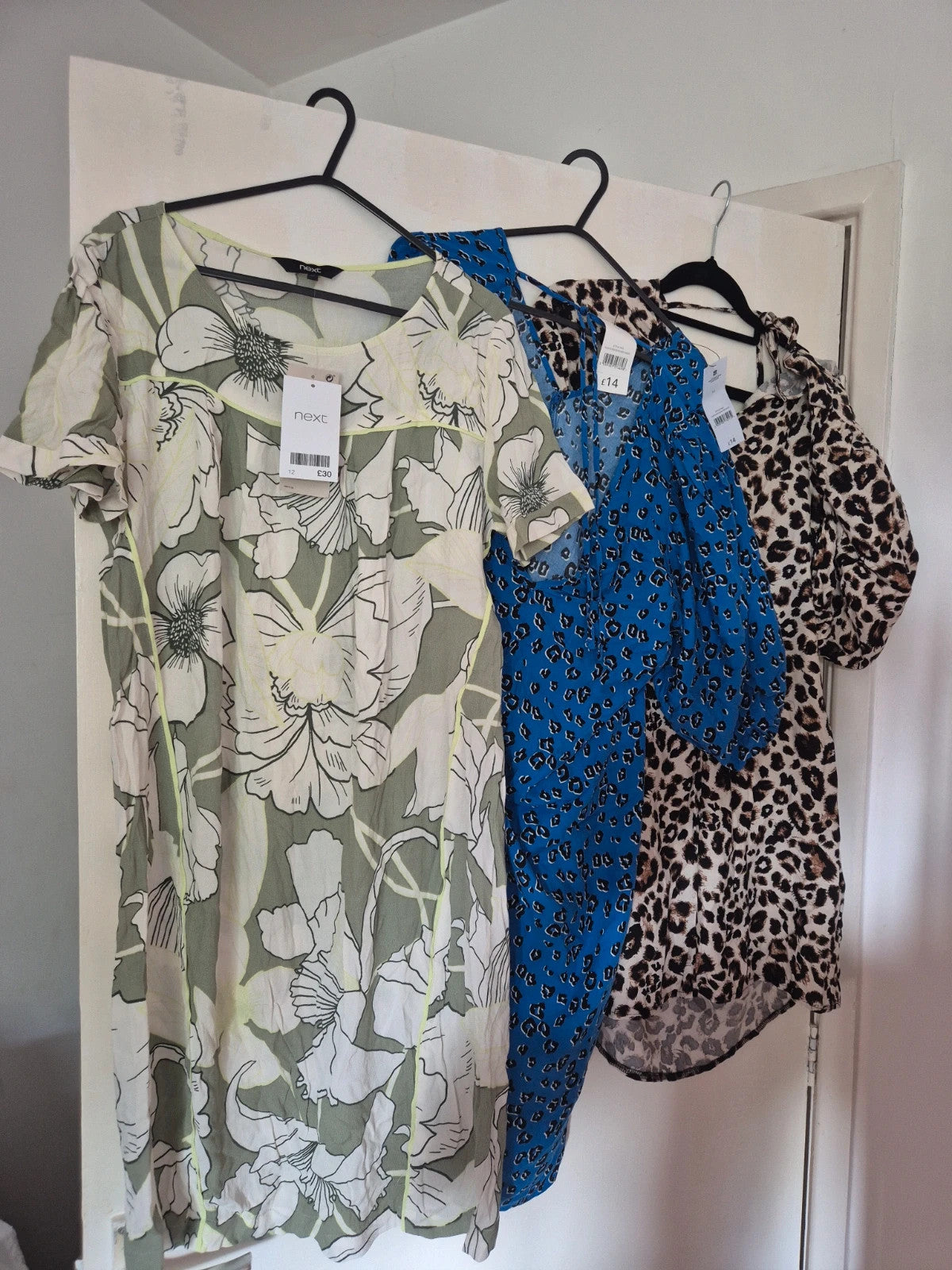 Next multi linen maxi dresses size 12 with tags, featuring vibrant floral patterns.