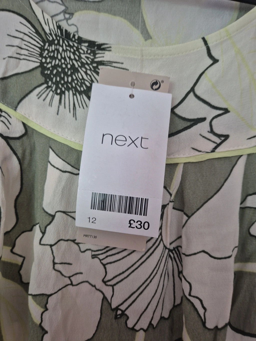 Next multi linen maxi dresses size 12 with tags, featuring vibrant floral patterns.