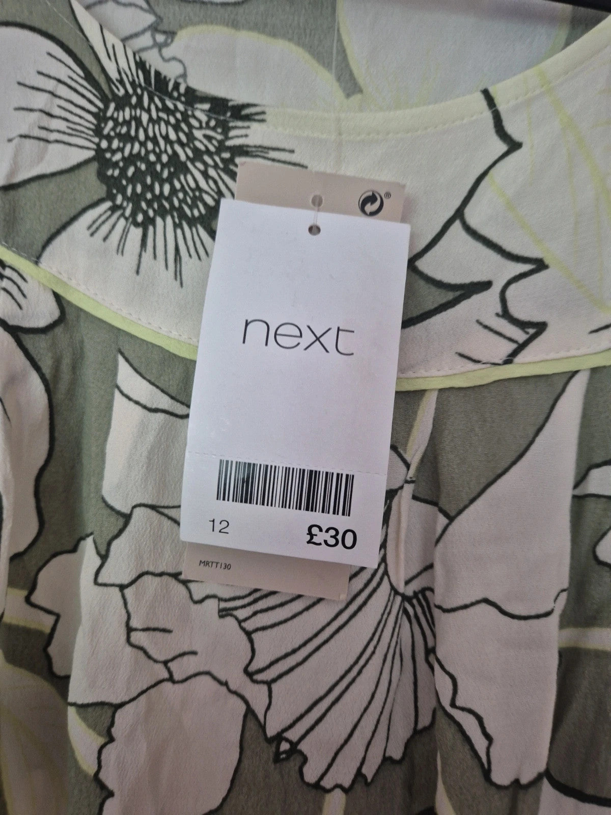 Next multi linen maxi dresses size 12 with tags, featuring vibrant floral patterns.
