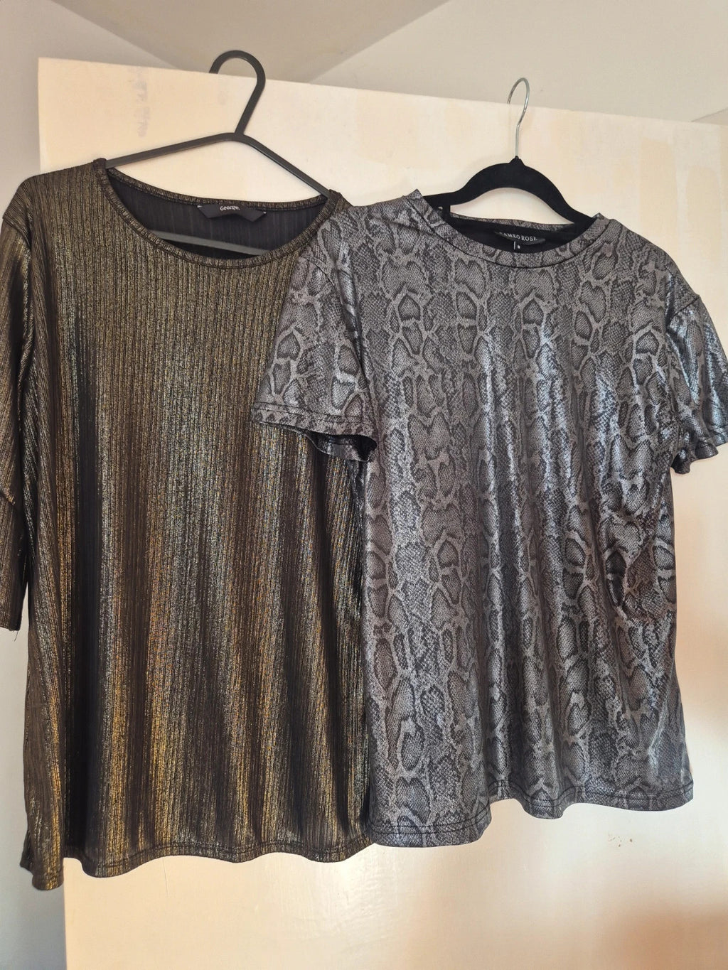 Cameo Rose black and gold top with elegant design, in mint condition.