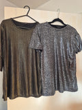 Cameo Rose black and gold top with elegant design, in mint condition.