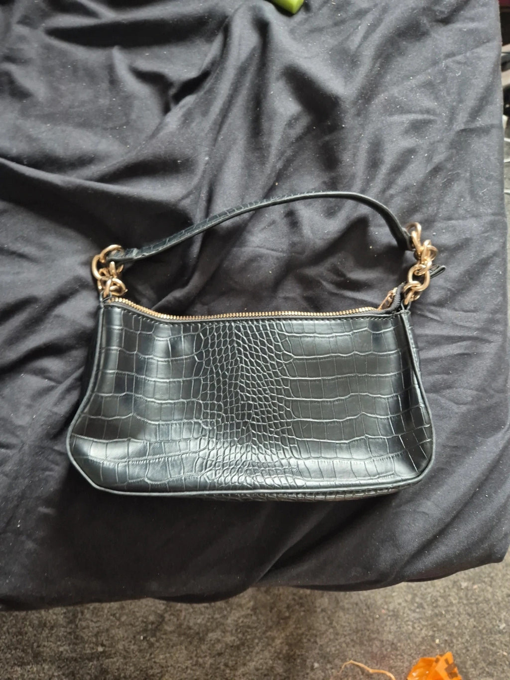 New Look black handbag with new logo, brand new without tags.