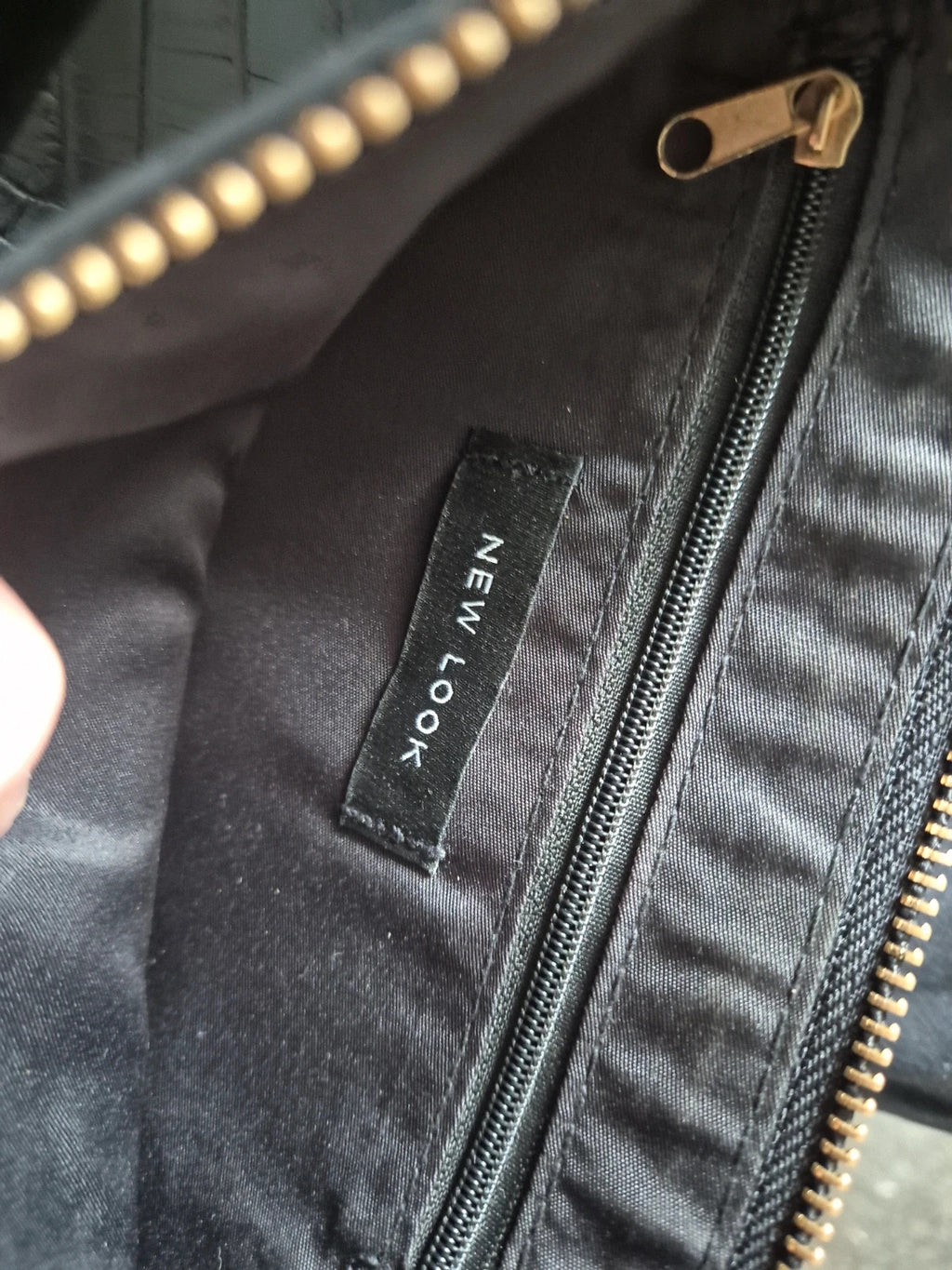 New Look black handbag with new logo, brand new without tags.