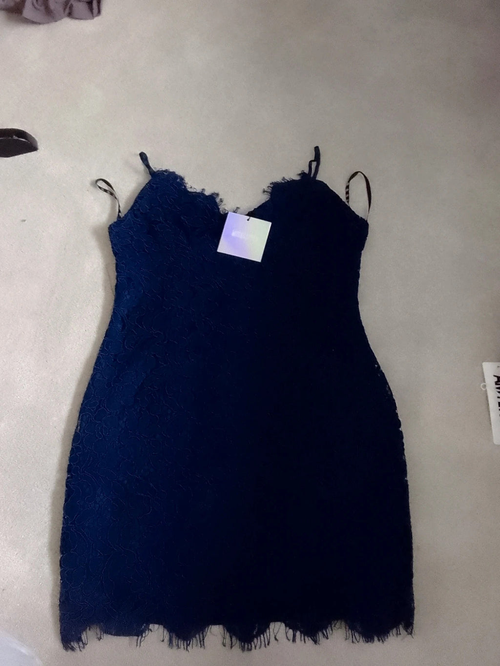 Missguided navy midi dress with lace bust, plunge neckline, and pockets.