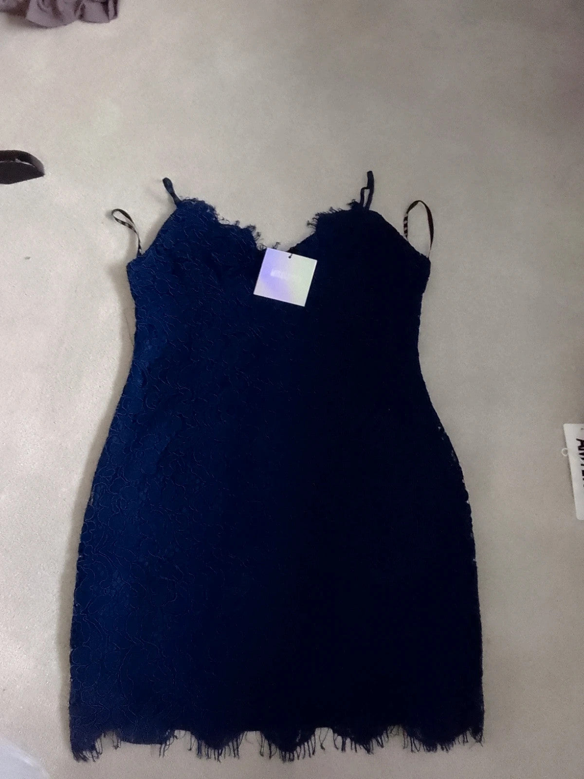 Missguided navy midi dress with lace bust, plunge neckline, and pockets.