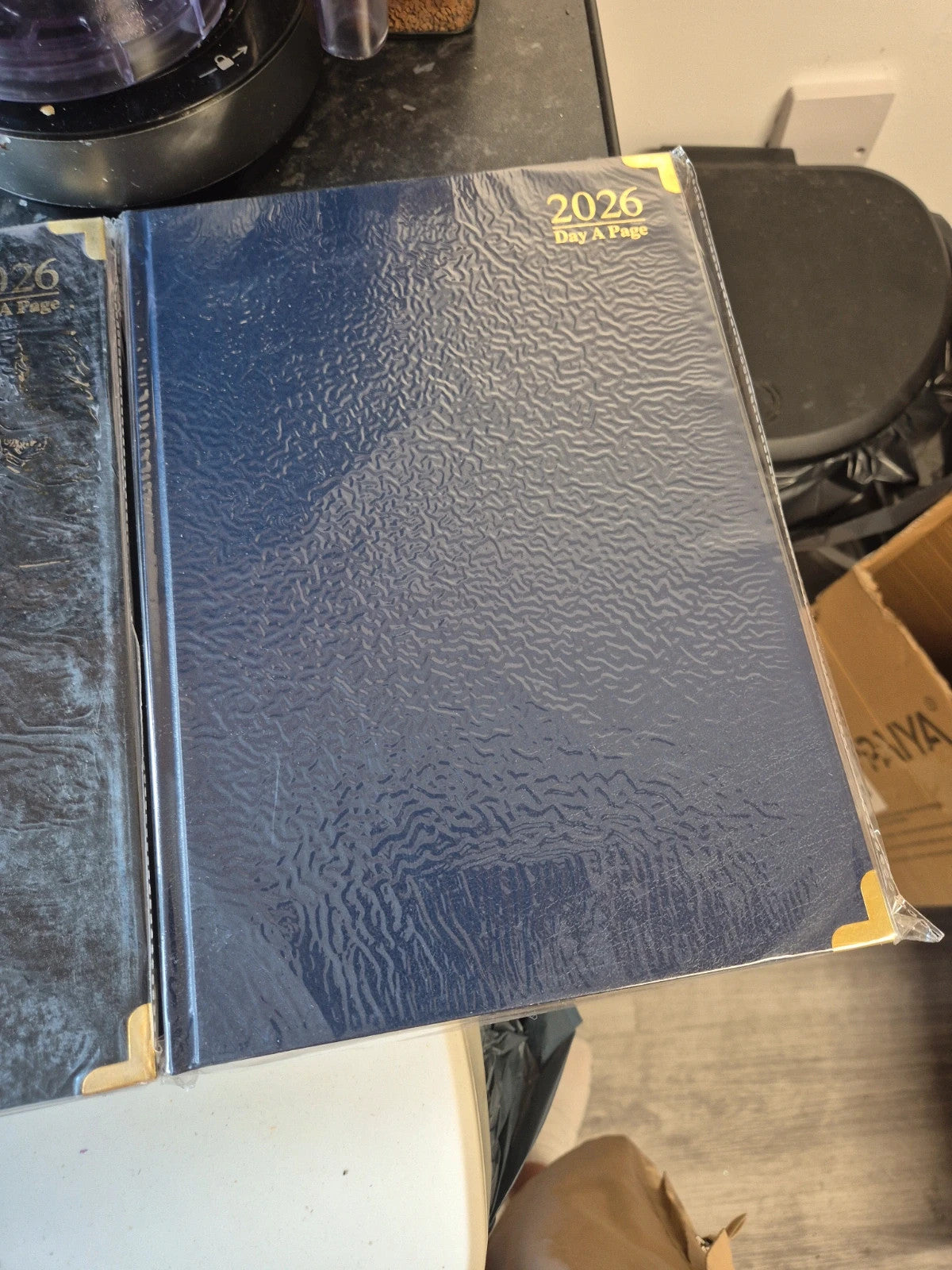 Notebook Therapy black and navy planners with sleek design and quality material.