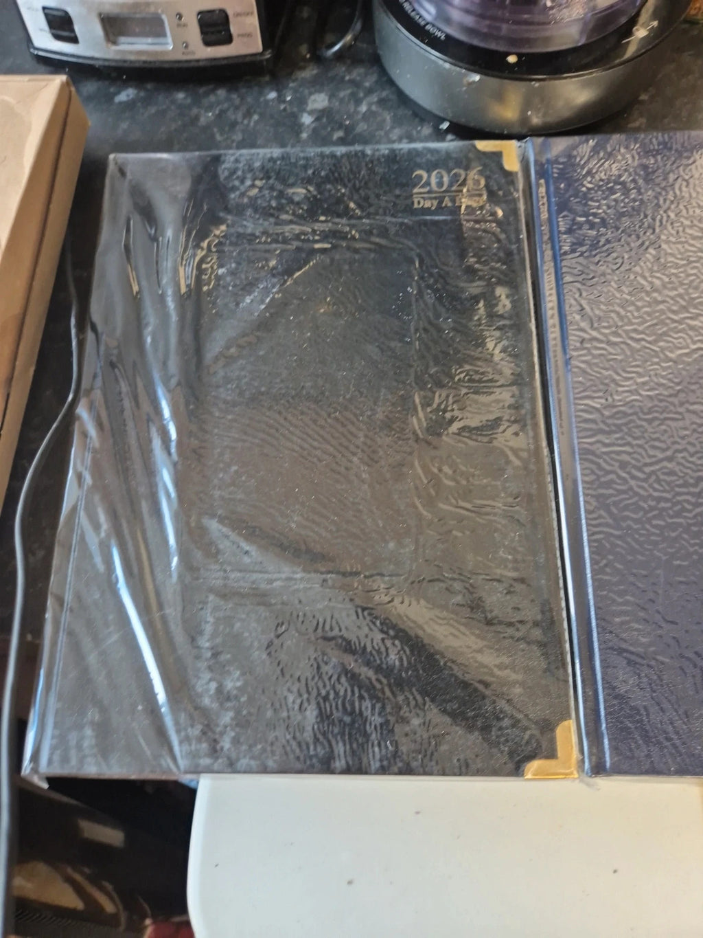Notebook Therapy black and navy planners with sleek design and quality material.