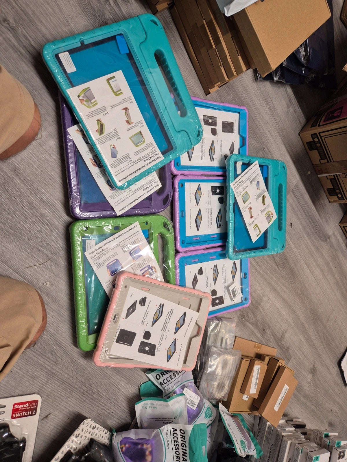 Accessories multi iPad cases assorted sizes, brand new with various colors and designs.
