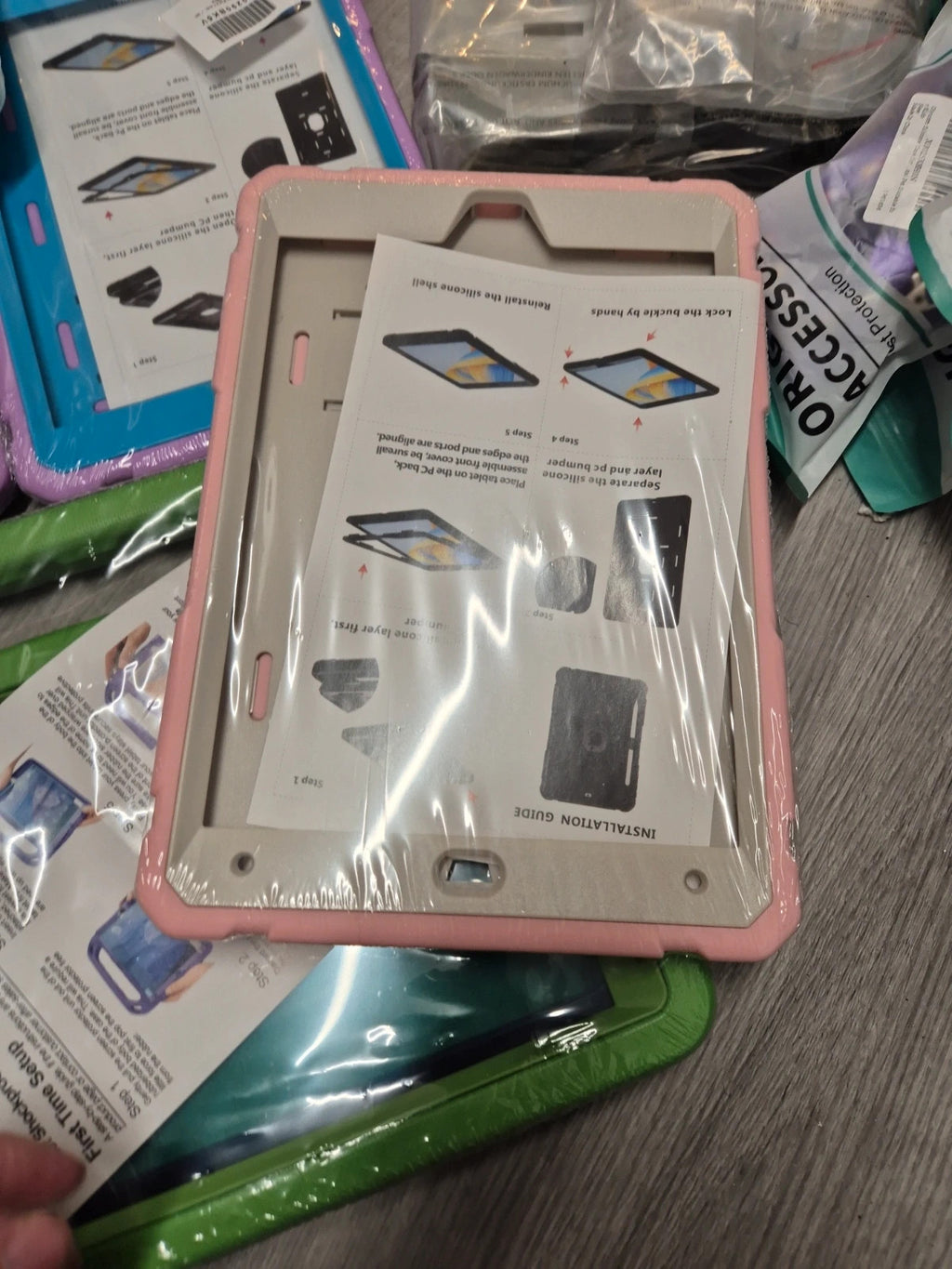 Accessories multi iPad cases assorted sizes, brand new with various colors and designs.