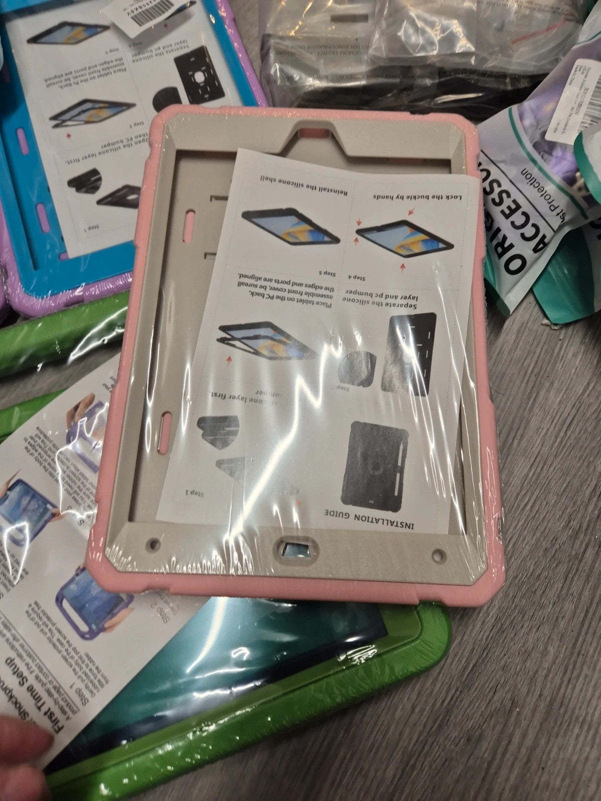 Accessories multi iPad cases assorted sizes, brand new with various colors and designs.