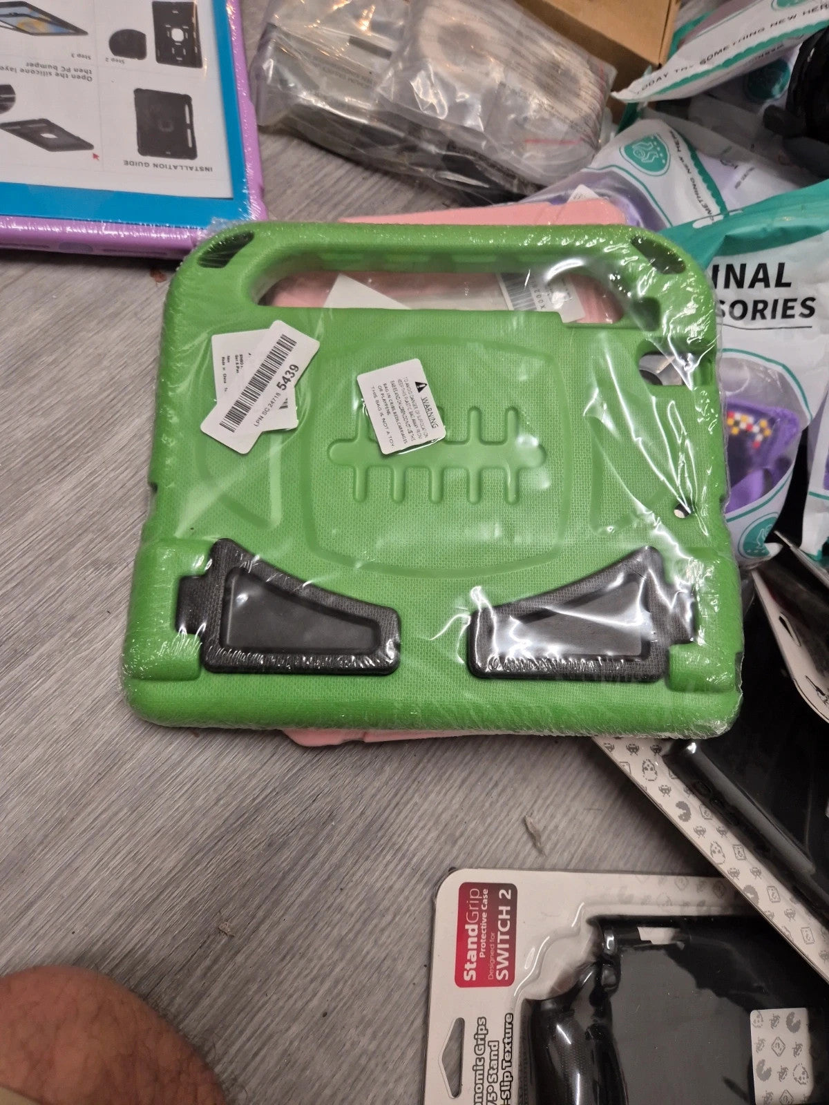 Accessories multi iPad cases assorted sizes, brand new with various colors and designs.