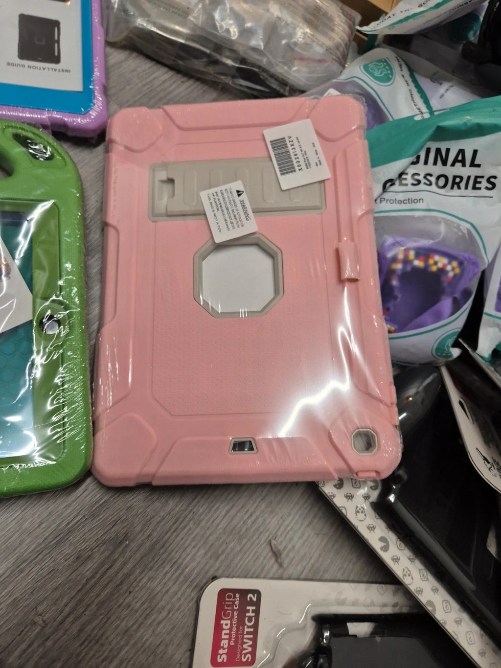 Accessories multi iPad cases assorted sizes, brand new with various colors and designs.