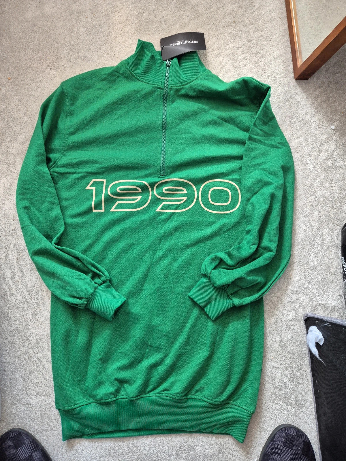 PrettyLittleThing green knit jumper with tags, featuring a soft texture and casual style.