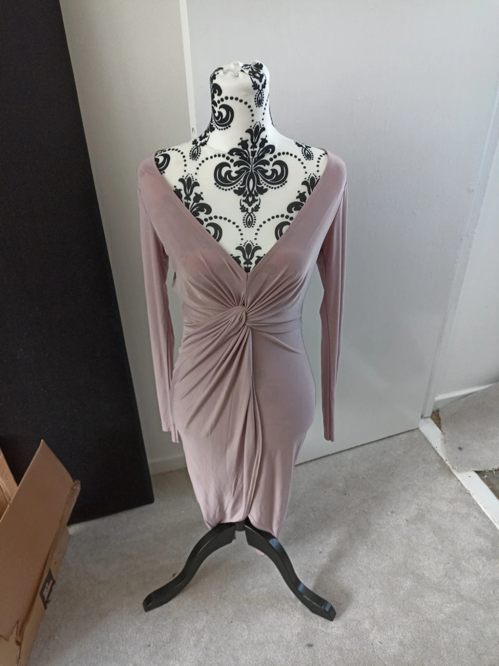 Boohoo pink bandage dress size 12, form-fitting design, new without tags.
