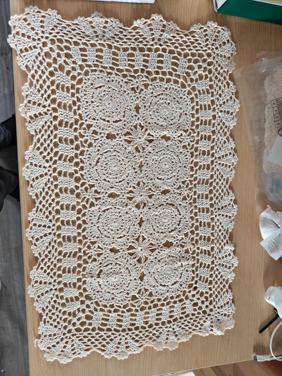 Source Unknown cream tablecloth clips and weights, new in packaging.