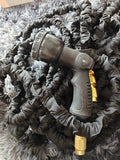 GARDEN black expandable garden hose 100ft kink-free with 10 function settings.