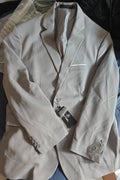 Autsel grey slim fit suit jacket with new tags, size XL, tailored design.