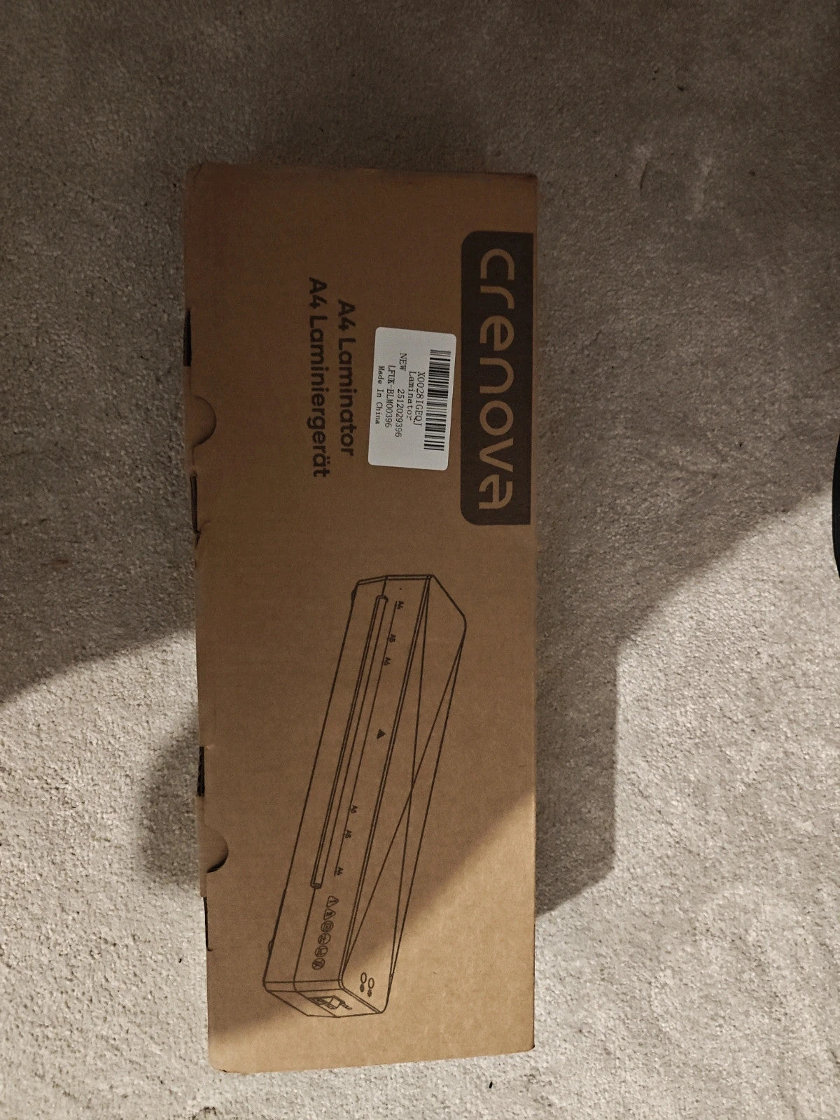 Crenova black A4 thermal laminator FNL001 with hot and cold laminating modes.