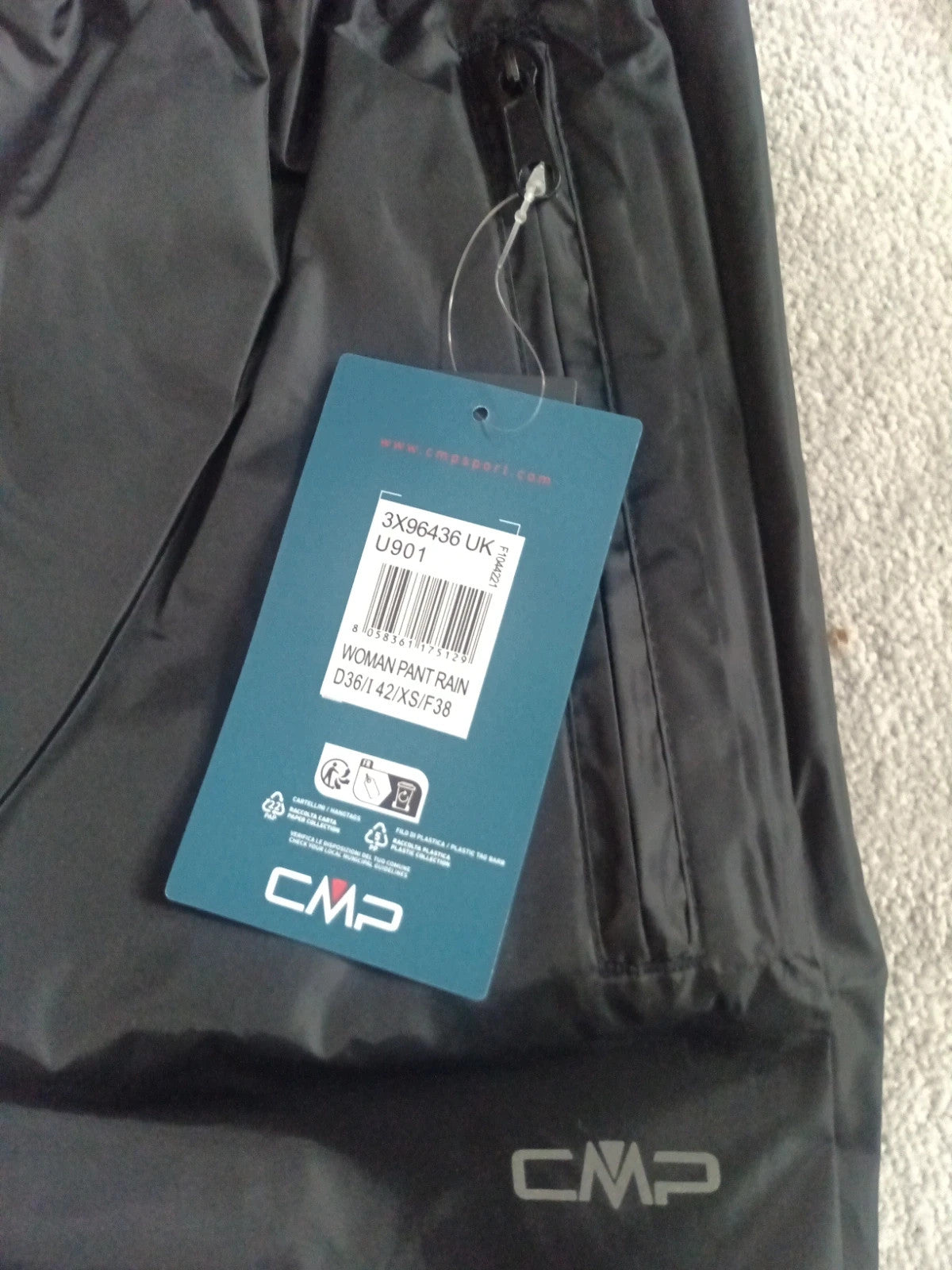 CMP black rain trousers size XS with tags, sleek design and lightweight material.