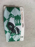 Harry Potter green and white face covering with printed logo and new with tags.
