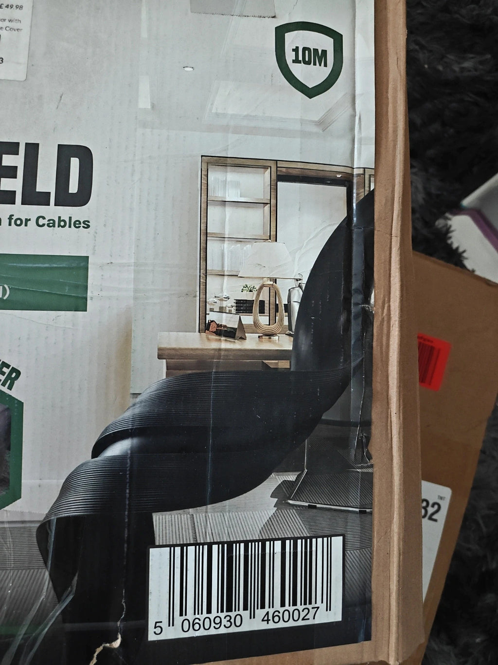 Deeba black floor cable covers with cable ties, new in box.